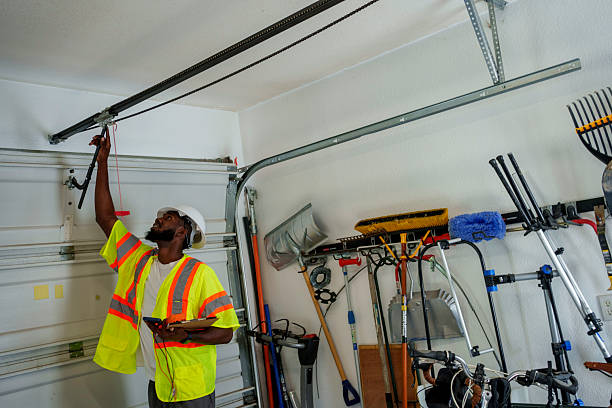 Professional Garage Door Panel Replacement technician working in Delaware County County, IA